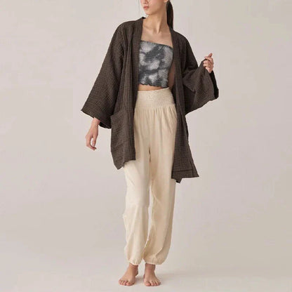 Premium 100% cotton cardigan with elegant open-stitch design, ideal for versatile everyday wear in the UK
