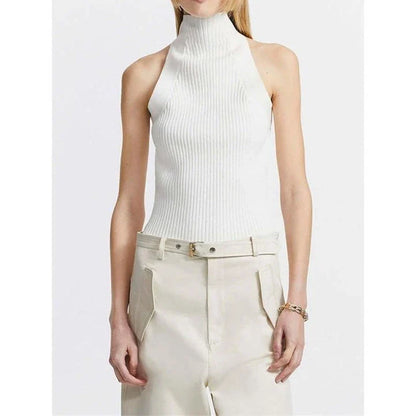 Elegant and versatile knitted sleeveless tank top with a unique hollow-out design, perfect for chic British style