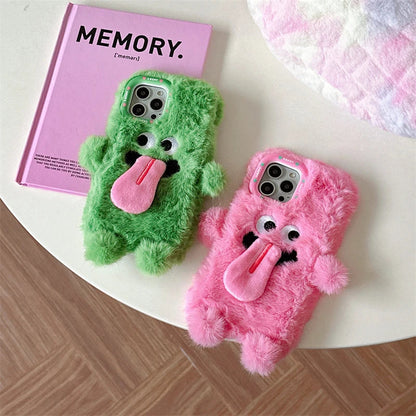 Playful plush phone case with cheeky cartoon monster in pink or green, offering shock-absorbing protection for iPhone models