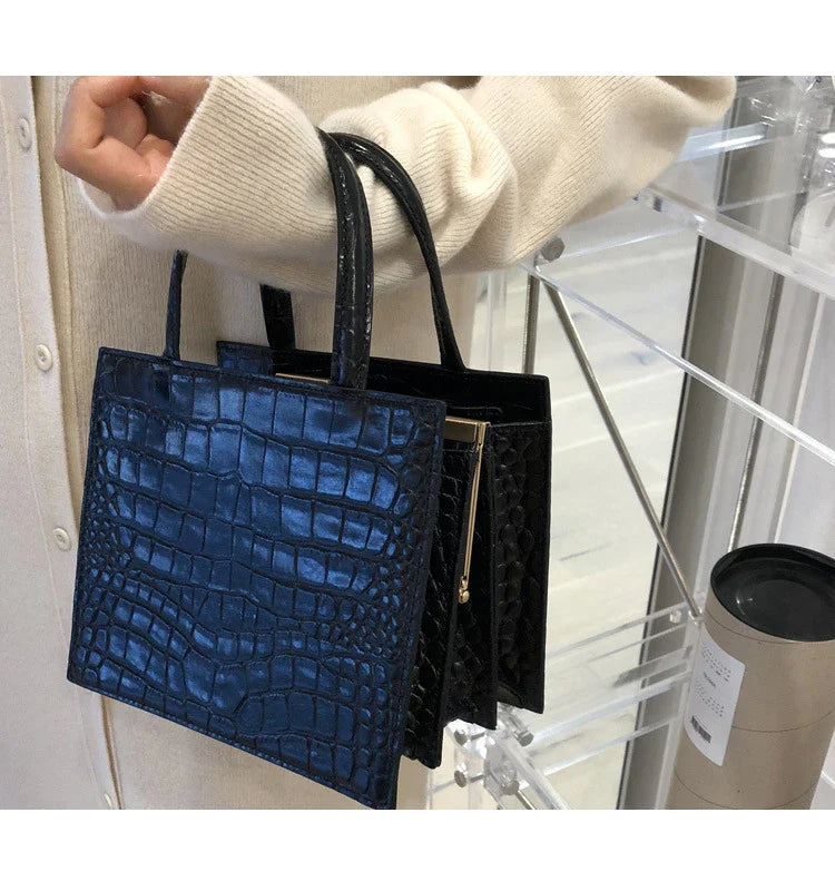 Retro one-shoulder messenger bag for women, made with premium PU materials and featuring a classic vintage-inspired design.