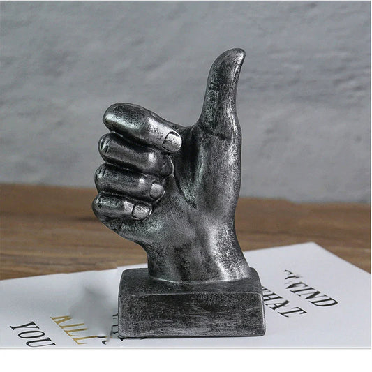Elegant resin gesture ornaments in a variety of classic bronze and silver finishes, perfect for adding a charming accent to British-inspired home decor