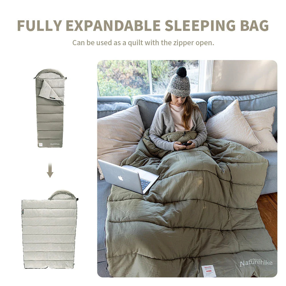 Premium lightweight double camping sleeping bag with cotton filling and terylene fabric, suitable for spring and autumn camping trips in the UK.