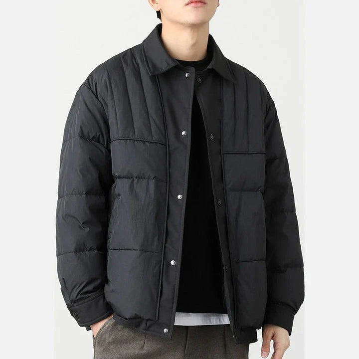 A premium lightweight down jacket in a sleek, tailored design for the stylish British gentleman