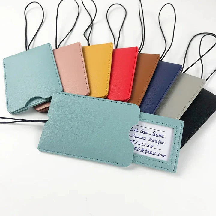 Premium PU leather luggage tags in a vibrant gray colour, with a discreet pull-out information card for easy customization.