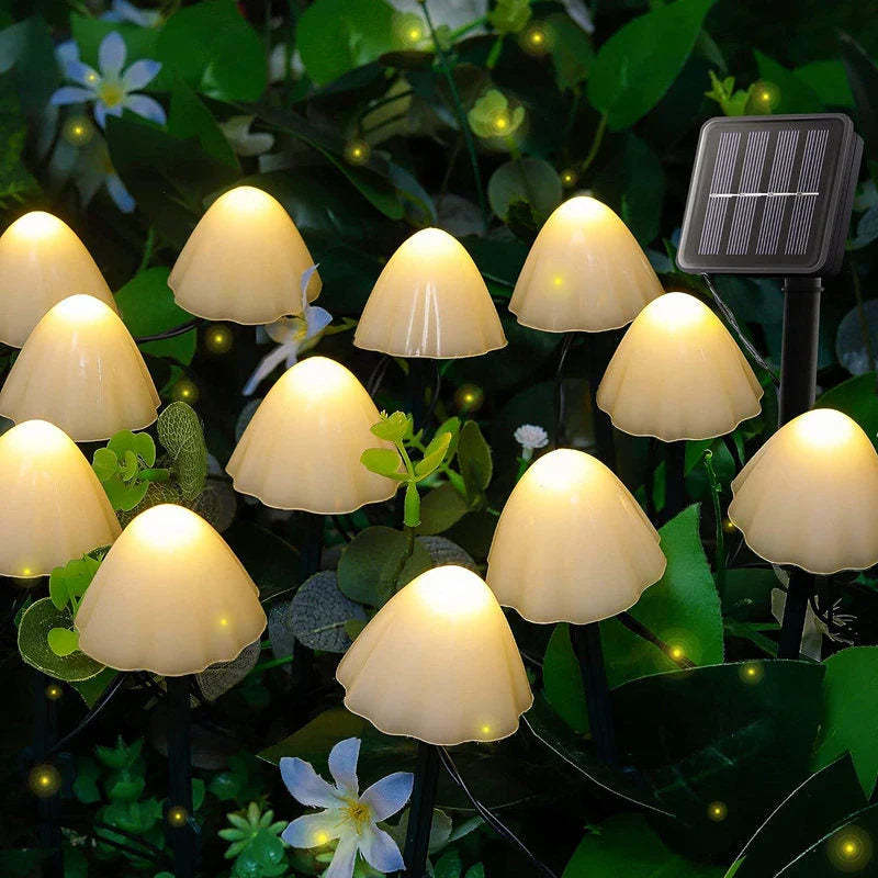Solar-powered mushroom-shaped pathway lights creating a magical ambiance in a garden or backyard