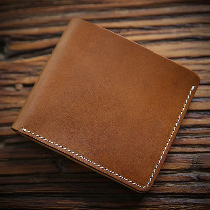 Premium first-layer cowhide money clip in a variety of classic British colours, designed for refined style and secure everyday carry