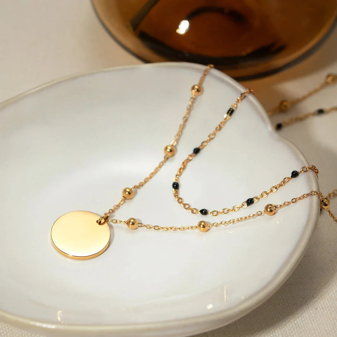 Elegant 18K gold plated black rice bead necklace, a sophisticated accessory for stylish women in the UK