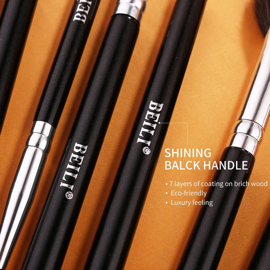 Set of 15 professional eye makeup brushes in a sleek black design, including brushes for brows, lashes, eyeliner, and eyeshadow blending.