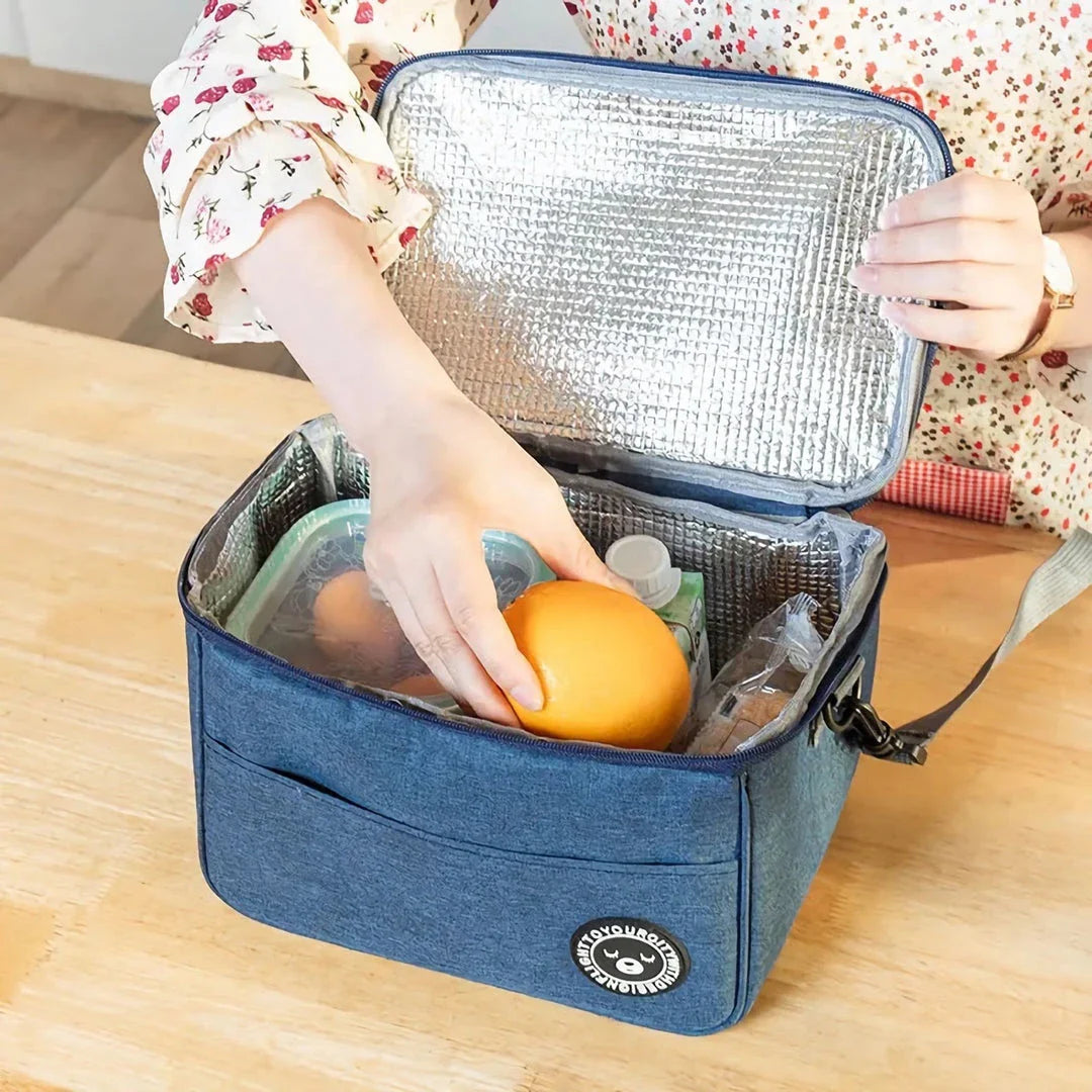 Premium thermal lunch bag in various colours, featuring insulation, waterproof design, and adjustable shoulder strap for busy UK professionals