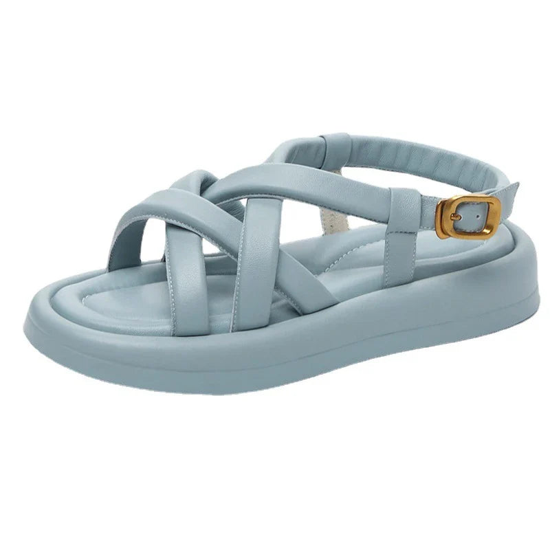 Premium thick-soled sandals in black, beige, and blue colours with a sheepskin upper and rubber sole