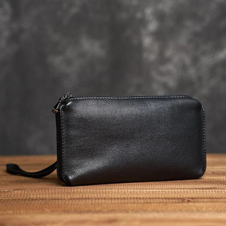 Premium genuine leather handbag in a sleek, contemporary design with secure zipper closure and internal organisation pockets