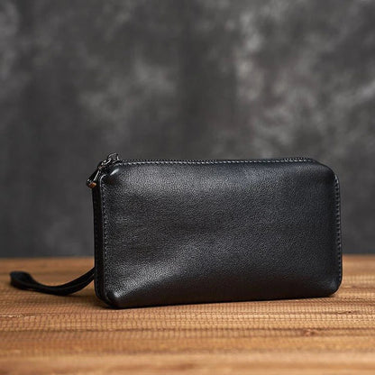 Premium genuine leather handbag in a sleek, contemporary design with secure zipper closure and internal organisation pockets