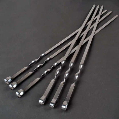 Premium stainless steel BBQ skewers with a flat design for even heat distribution and easy handling