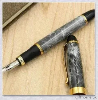 A premium fountain pen with a flexible calligraphy nib, allowing for expressive strokes and elegant writing