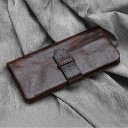 Premium leather wallet with concealed cash compartment, multiple internal slots, and minimalist urban design