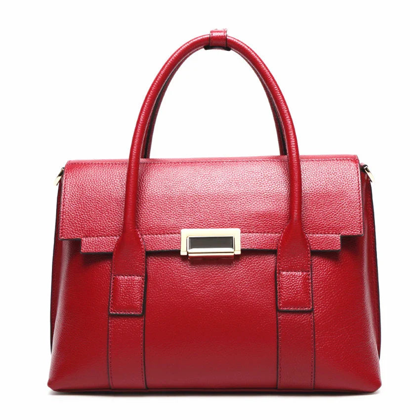 Premium first-layer cowhide leather shoulder bag with adjustable strap, spacious interior, and classic fashion design