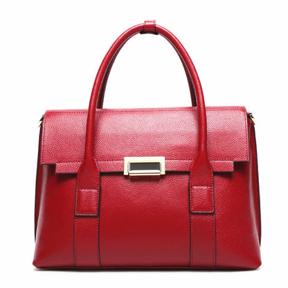 Premium first-layer cowhide leather shoulder bag with adjustable strap, spacious interior, and classic fashion design