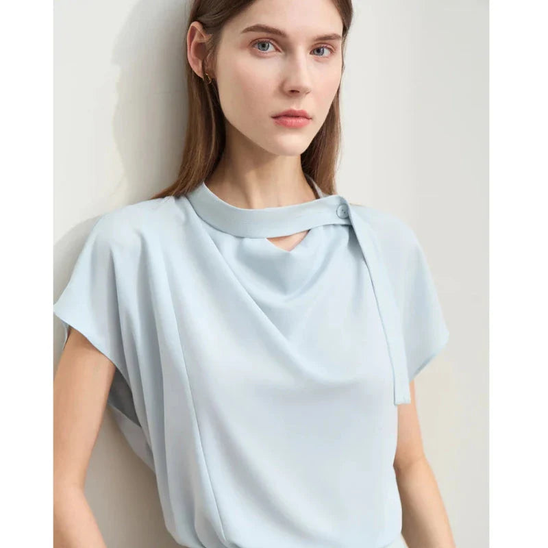 Elegant minimalist women's summer blouse in blue chiffon fabric with tie sleeves and hollow-out decoration