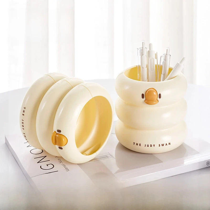 Stylish cartoon desk organiser with spacious circular design and cute cartoon motif for storing pens, pencils, and other desk essentials