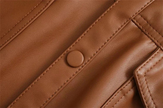 Stylish British-made faux leather jacket with stitching details and adjustable belt for a customized fit