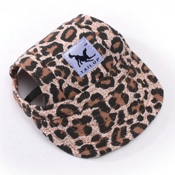 A stylish canvas pet cap with vibrant animal-themed prints, designed for comfort and fashion-forward canine companions.