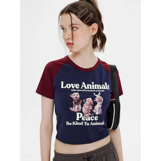 Charming Animal Print Raglan Crop Top with eye-catching graphic and contrasting sleeves