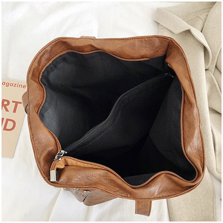 Premium British leather tote bag in black, featuring a large capacity design and stylish, versatile appeal.