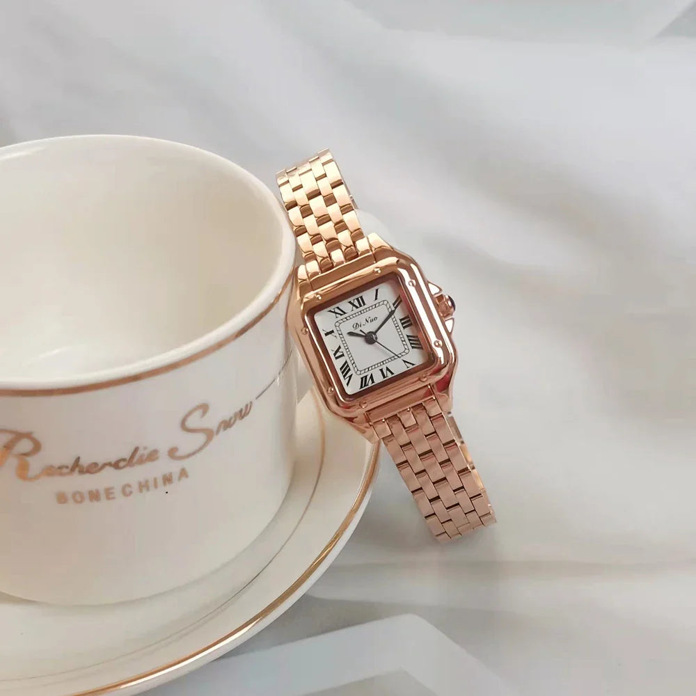 Elegant square quartz watch with a fine steel band, featuring a minimalist design and precise timekeeping.