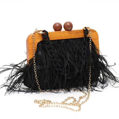 Luxury feather evening clutch with elegant acrylic chain decoration in green colour