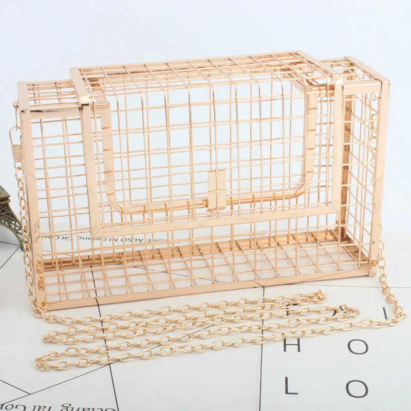 A sophisticated British-designed metal mesh clutch bag with a chain strap, available in various colours and chain styles