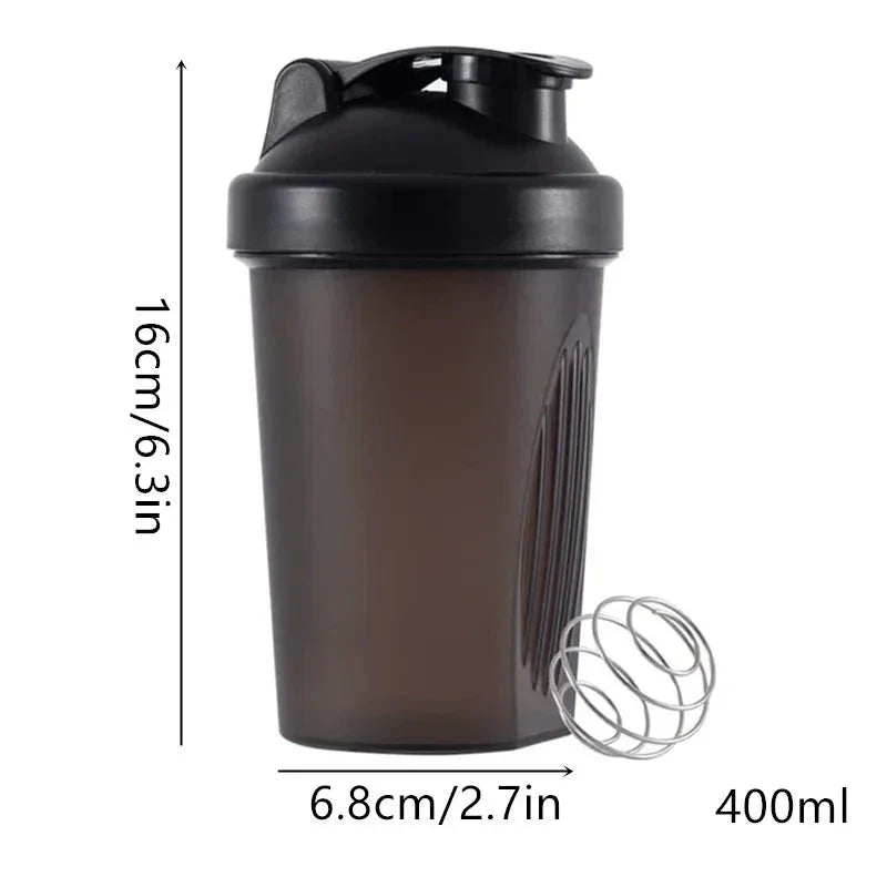 Premium protein shaker bottle with stainless steel whisk ball, BPA-free plastic, and leak-proof design for on-the-go fitness enthusiasts in the UK.