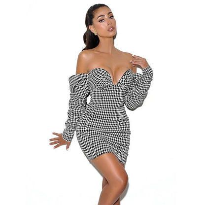 Sophisticated houndstooth wrap dress with flattering high waist and premium polyester construction