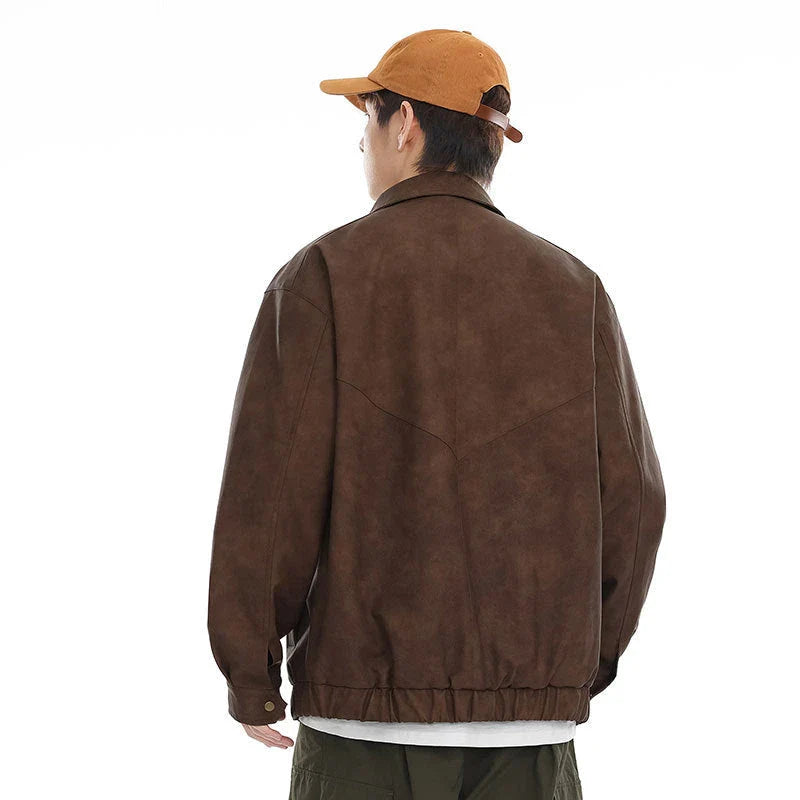 Premium vintage-inspired PU leather jacket in brown and grey colours, featuring a relaxed, tailored fit for the discerning British gentleman.
