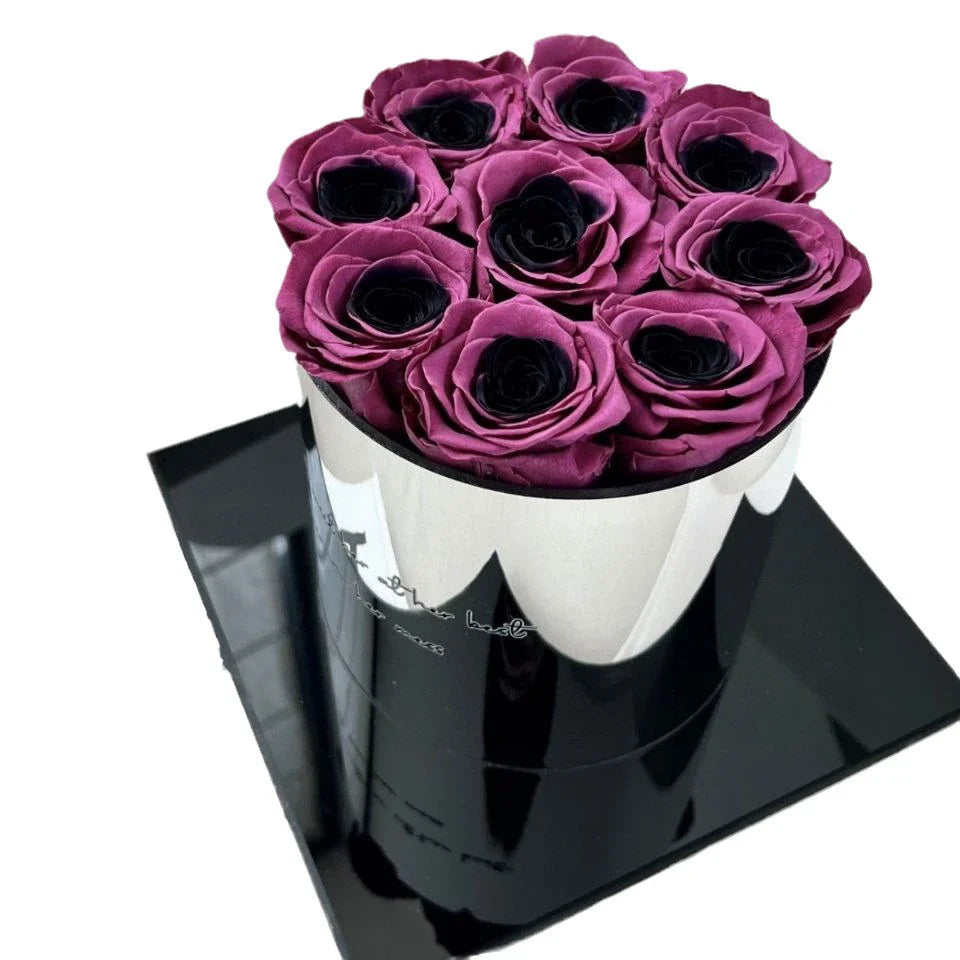 Elegant black plum bow flower pot with preserved plum blossoms, a sophisticated and long-lasting home decor piece