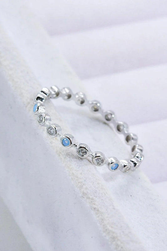 Elegant 925 sterling silver ring with natural moonstone centrepiece and zircon accents