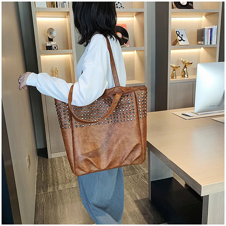 Premium British leather tote bag in black, featuring a large capacity design and stylish, versatile appeal.