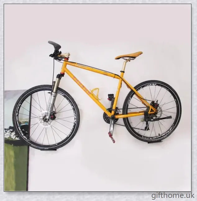 Sturdy black carbon steel bicycle wall mount rack for securing bikes and mountain bikes to the wall