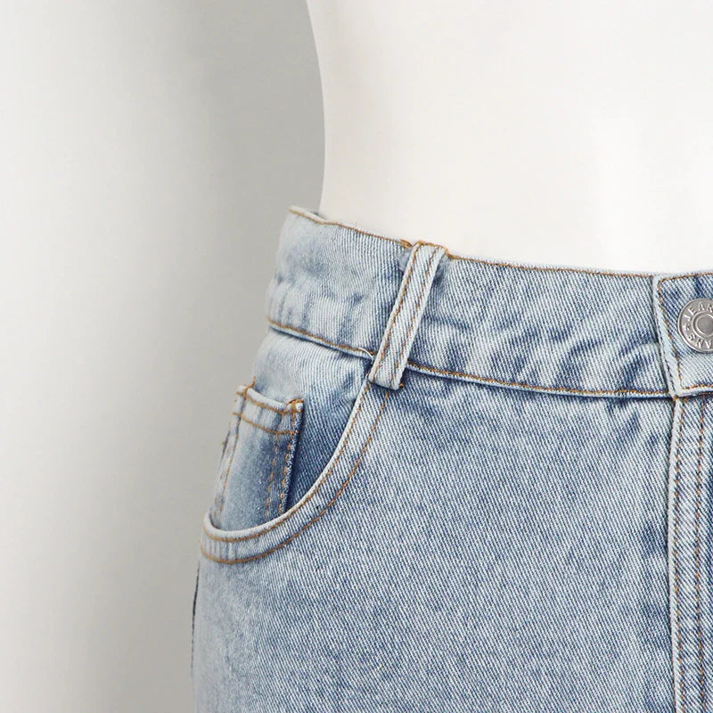 High-waisted wide-leg denim trousers in a stylish blue colour, featuring a comfortable and flattering fit
