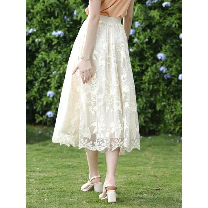 Elegant floral lace A-line skirt in apricot colour, featuring a flattering silhouette and intricate embroidery