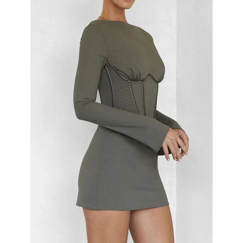 Elegant backless mini dress with full sleeves, made from a premium cotton-polyester blend for comfort and durability.