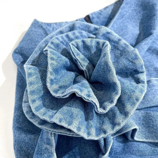 Chic high-waist blue denim skirt with elegant 3D rose floral detail, perfect for British summer fashion