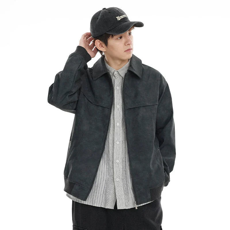 A classic distressed leather jacket in a relaxed, unstructured fit suitable for both men and women