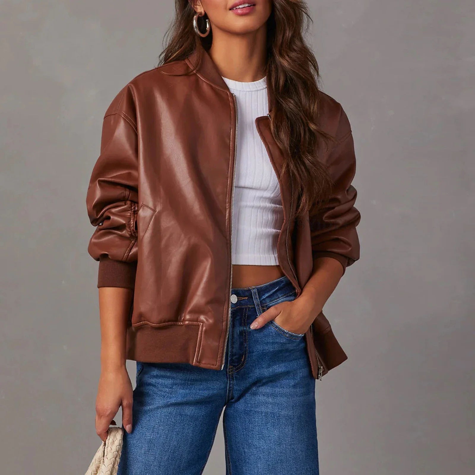 Stylish leather baseball jacket with Peter Pan collar, perfect for casual British streetwear