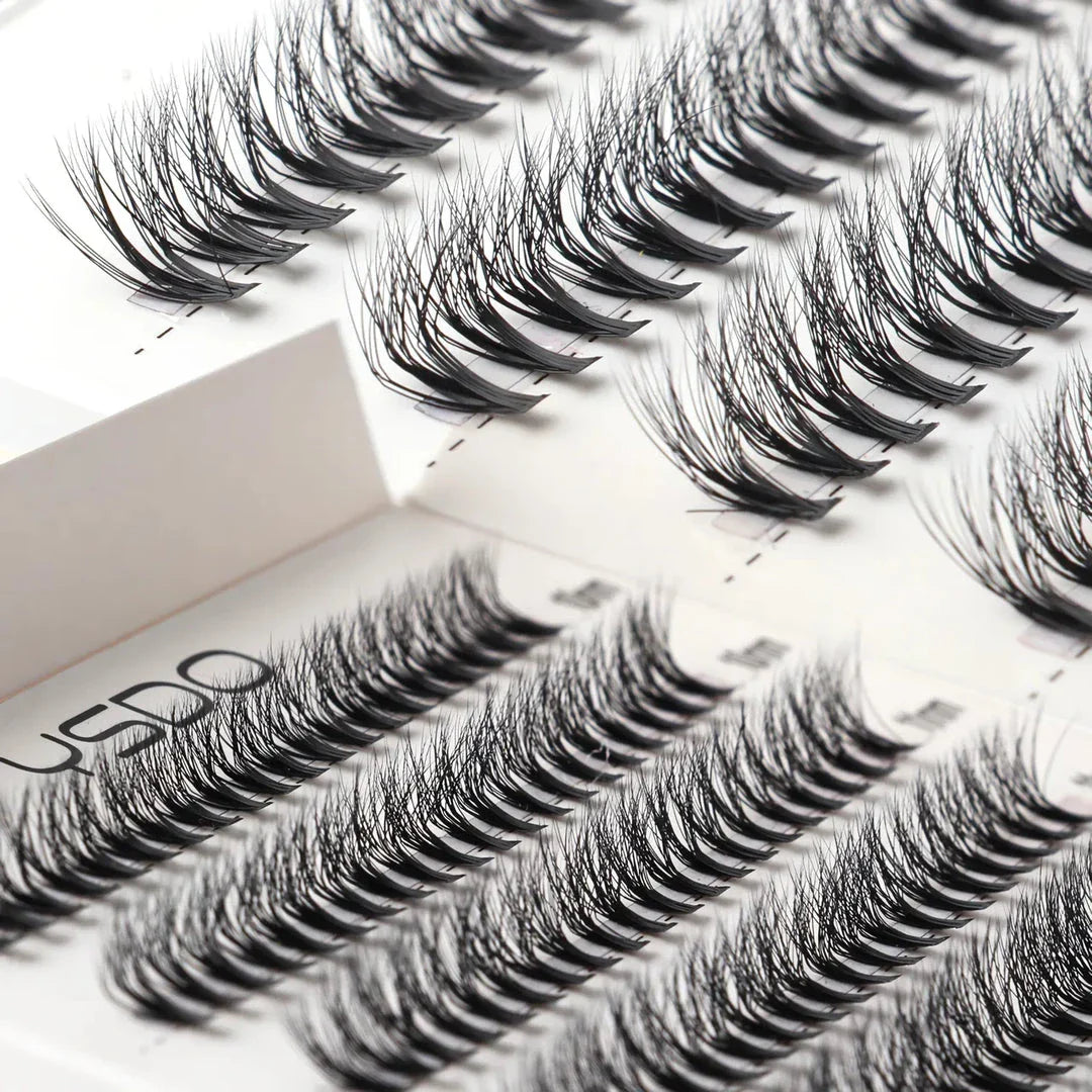 Premium mink eyelash extensions in various lengths and thicknesses for a captivating, natural-looking eye enhancement
