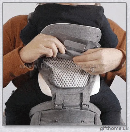 Ergonomic front-facing baby carrier with padded waist strap, lumbar support, and versatile wearing options for comfortable, secure travel with your little one.