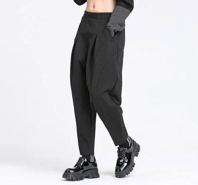 Stylish high elastic waist black harem trousers with a split joint design, offering a comfortable and fashionable look