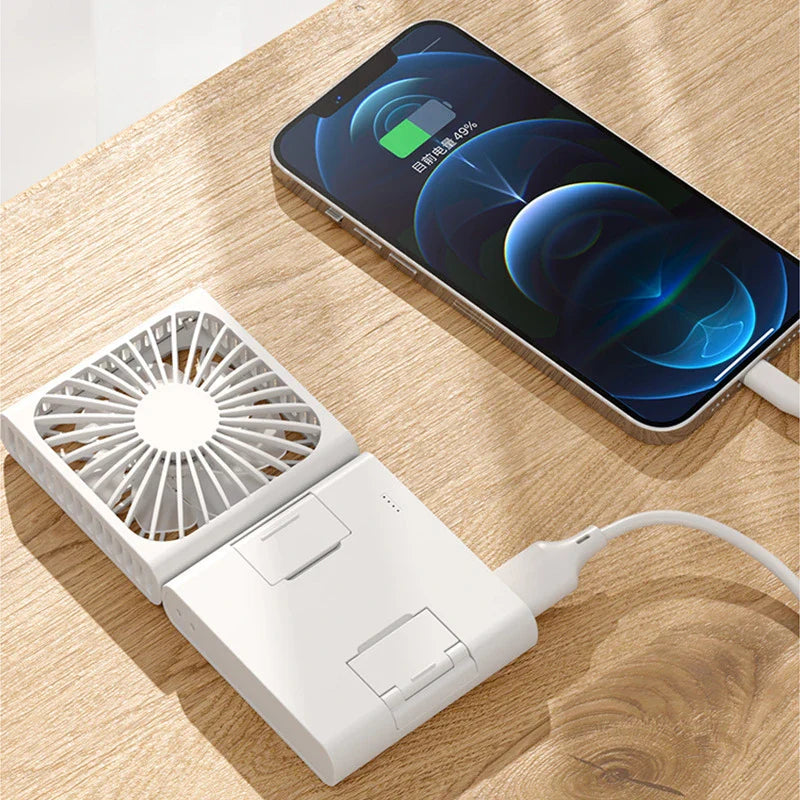 Compact portable USB power bank with built-in cooling fan, perfect for on-the-go use by British consumers