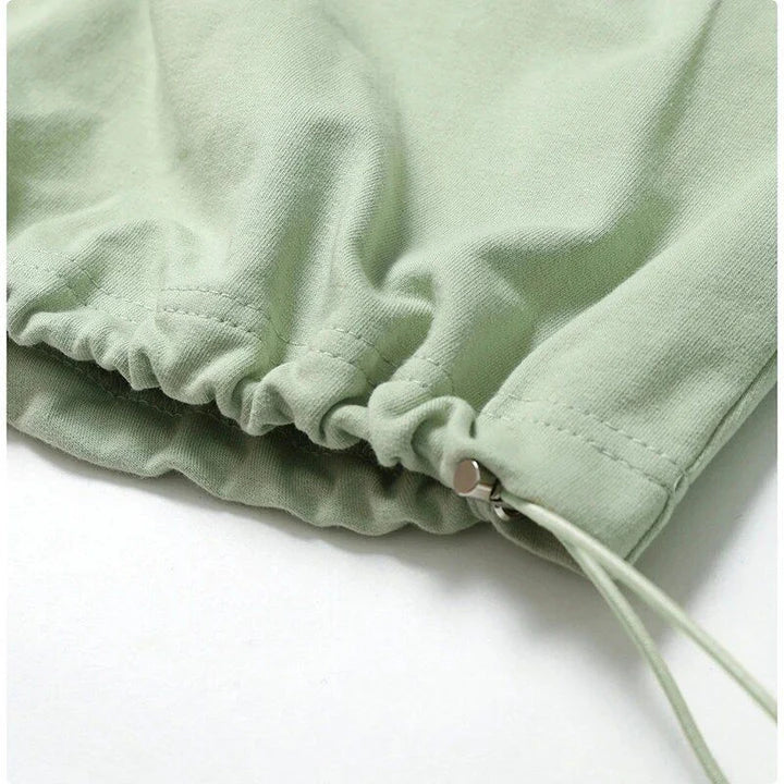 A cosy, oversized cotton pullover with a stylish zipper accent, perfect for casual autumn and winter wear.