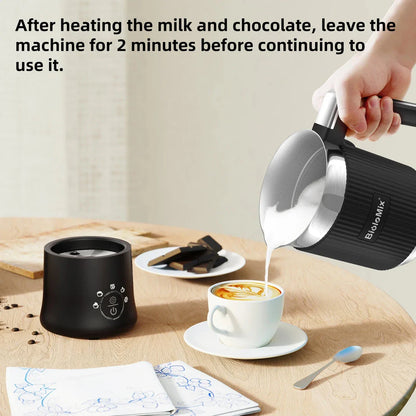 A stainless steel and black 5-in-1 automatic milk frother that can create hot, cold, and frothed milk for delicious coffee, latte, cappuccino, and hot chocolate drinks