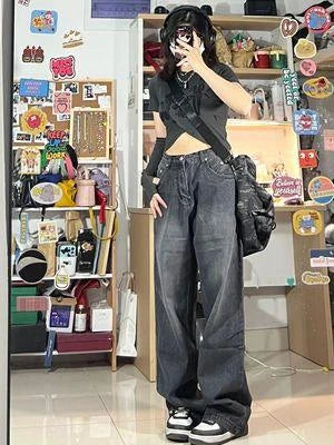 Women's high-waist, wide-leg black denim jeans with multiple pockets and vintage-inspired wash
